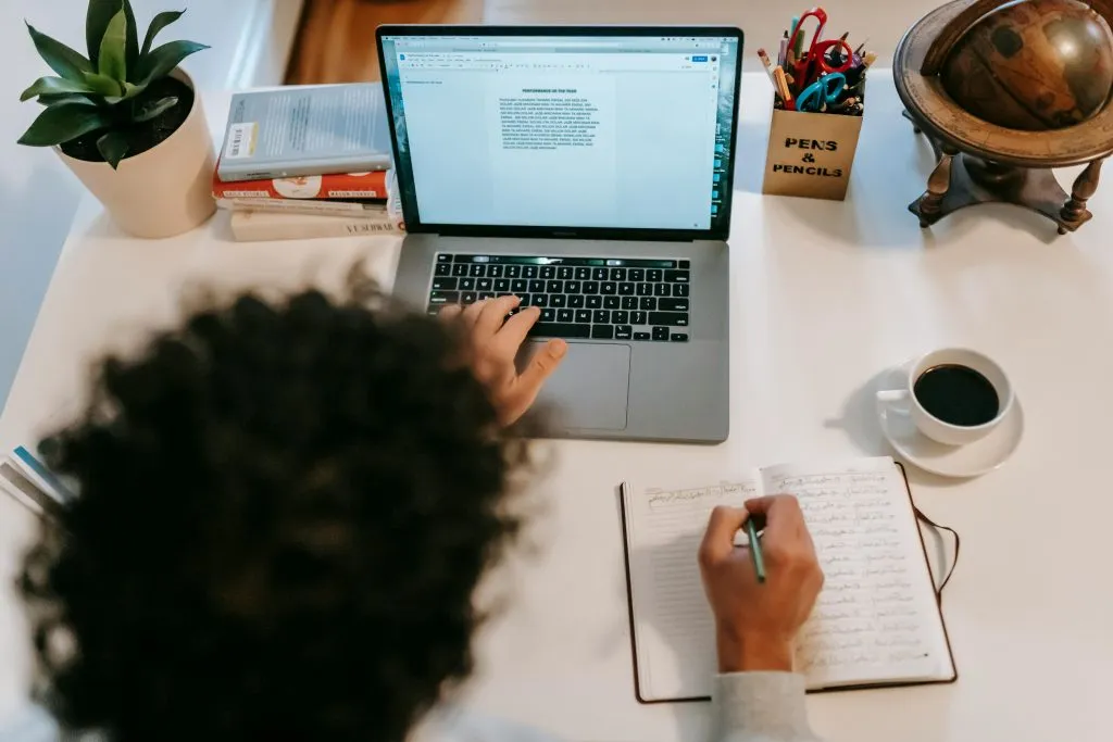 Writer sitting at her computer