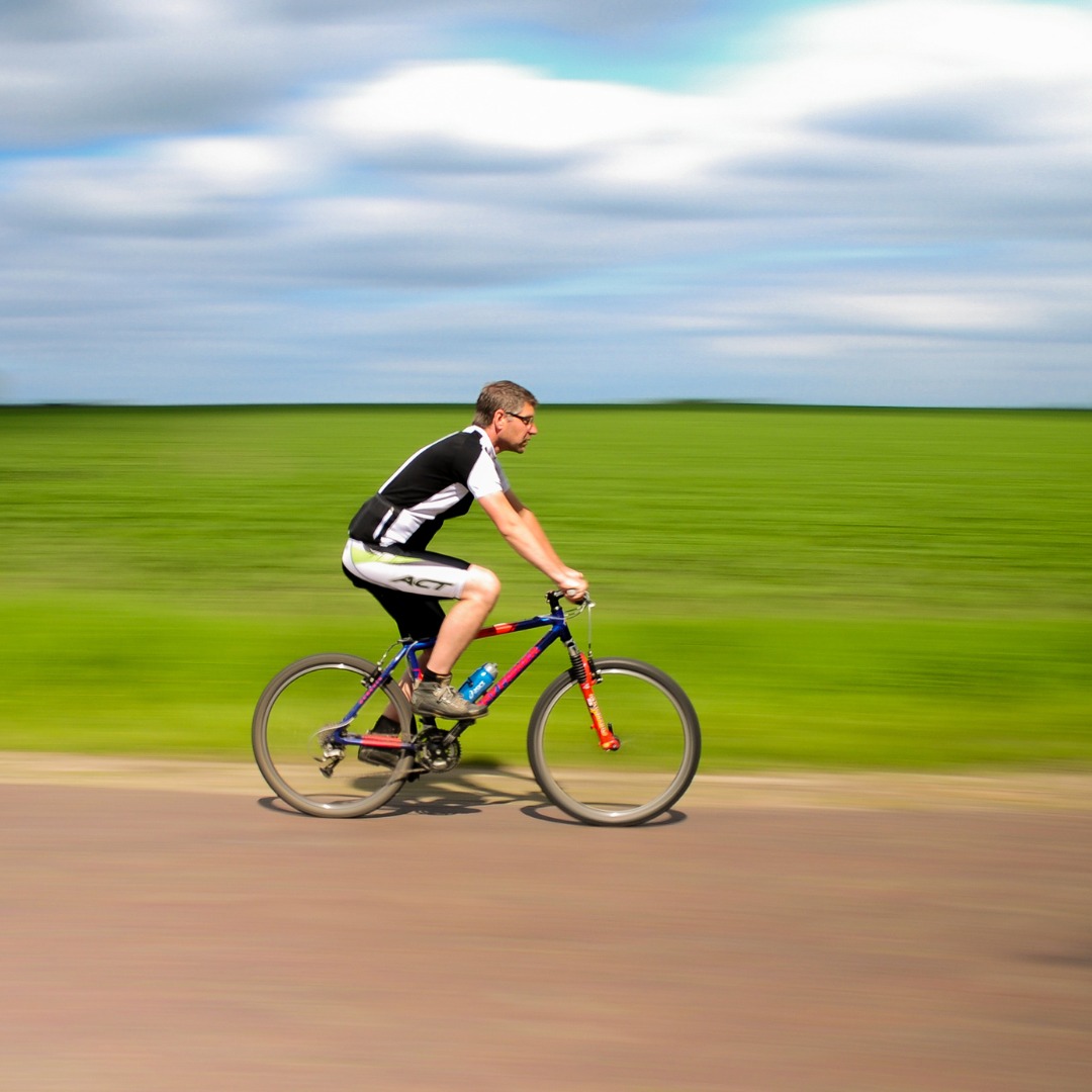 Cyclist riding bike