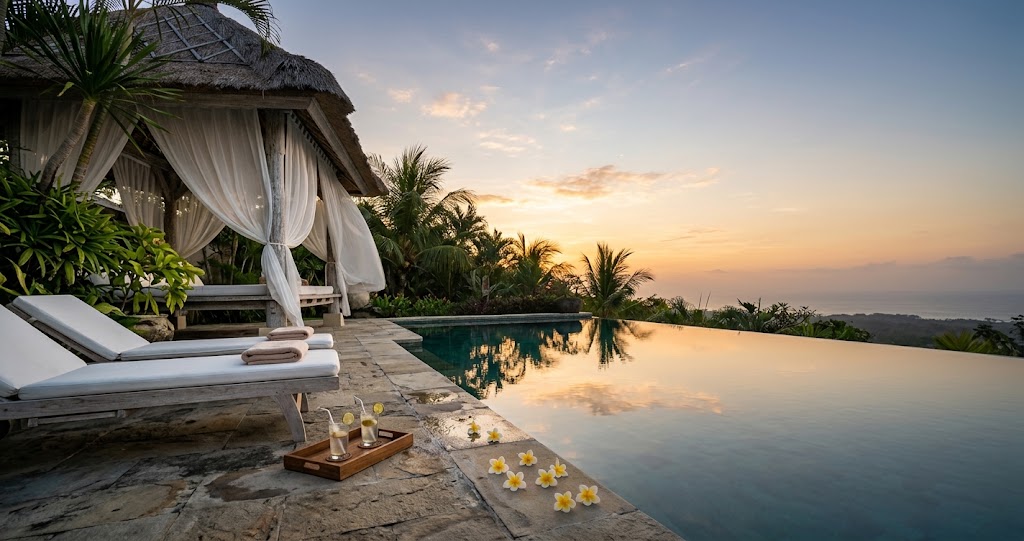 A private pool villa at sunset in one of the most affordable luxury travel destinations